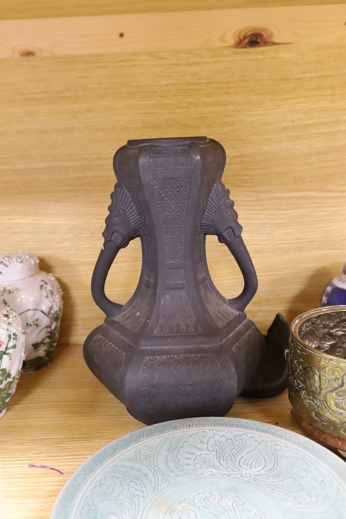 A Chinese blue and white planter, 10cm tall, together with a crackle glaze planter, a Chinese copper and brass jardiniere, a faux bronze type vase, a Chinese famille rose pedestal dish, 23cm, a Thai celadon dish, and a b